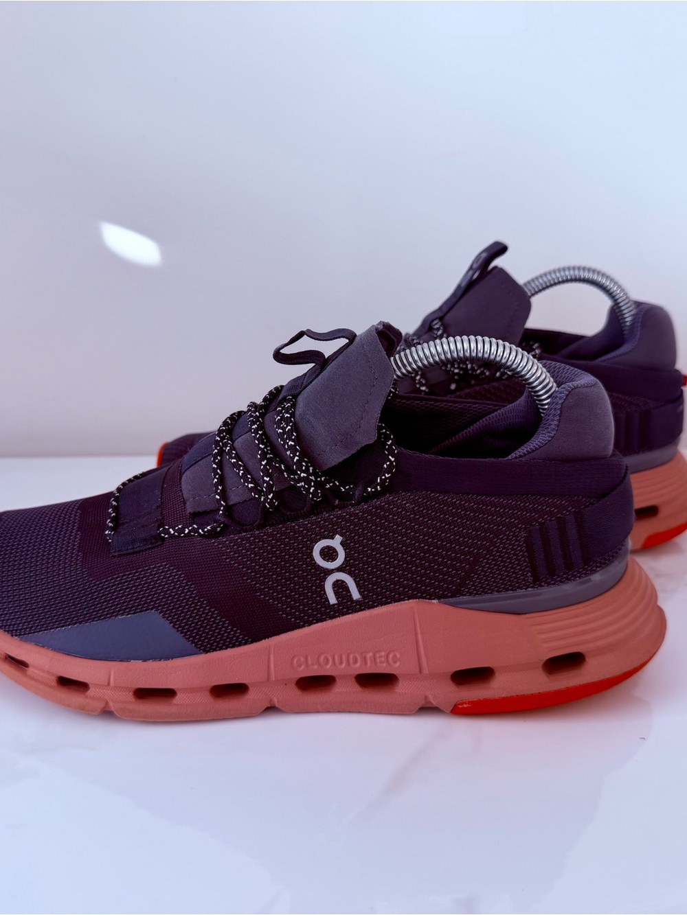 On Cloudnova Men’s Size 8.5 sneaker in the Eclipse/Rose colorway